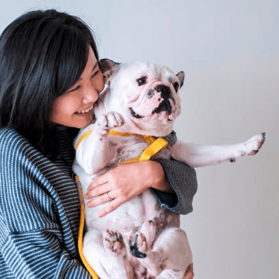 Picture of woman holding dog