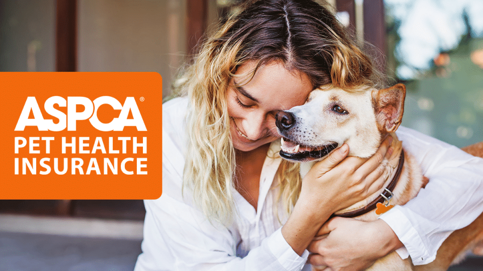 The ASPCA® Pet Health Insurance program woman hugging dog
