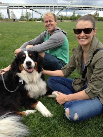 Rover.com Blog // Couple with Bernese Mountain Dog at The Fields park in Portland, Ore.