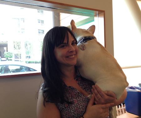 French Bulldog Piggy gets a hug at Rover HQ Brandie gives Piggy a hug at Rover HQ / Rover.com Blog