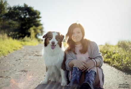 Dog and woman in the sun