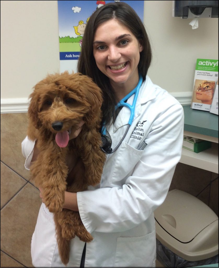 Dr. Caroline Rehm Hassell, DVM, and her dog Maggie