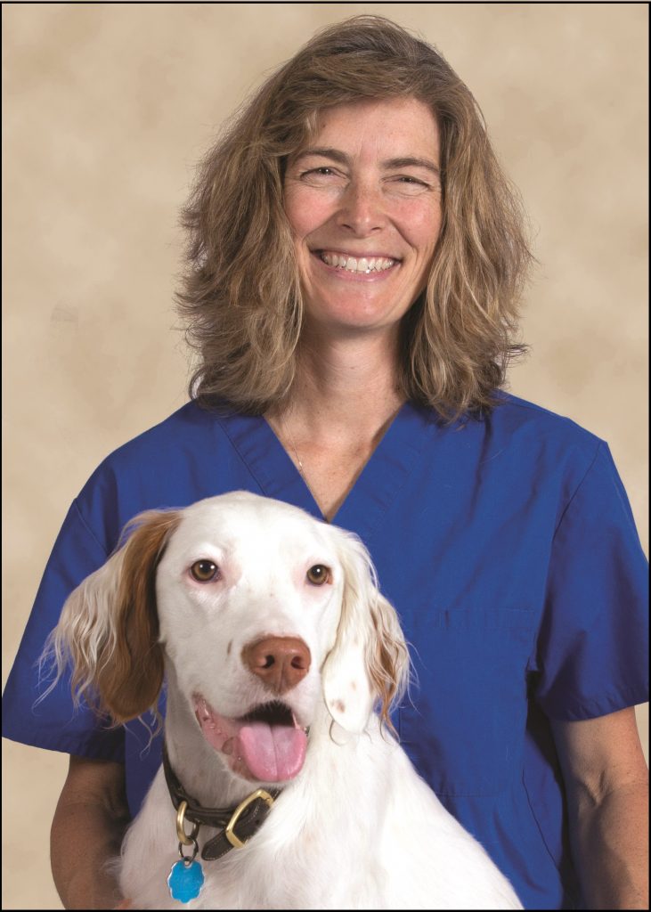 Dr. Coby Richter, DVM, and her dog Pax