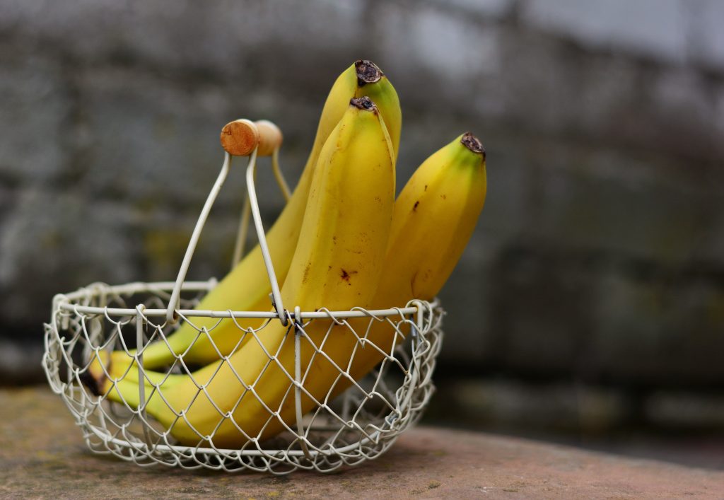 Can dogs eat bananas like this fresh bunch? Yes, in moderation.