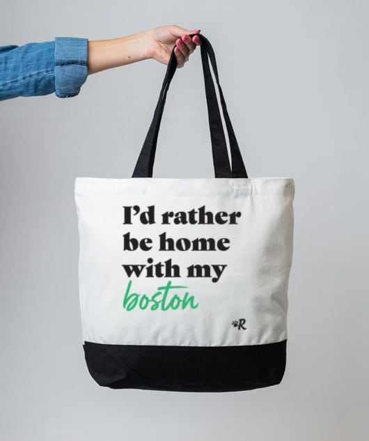 tote bag gift, white with black bottom and handles with black text reading "I'd rather be home with my boston"