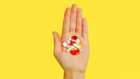 hand full of vitamins