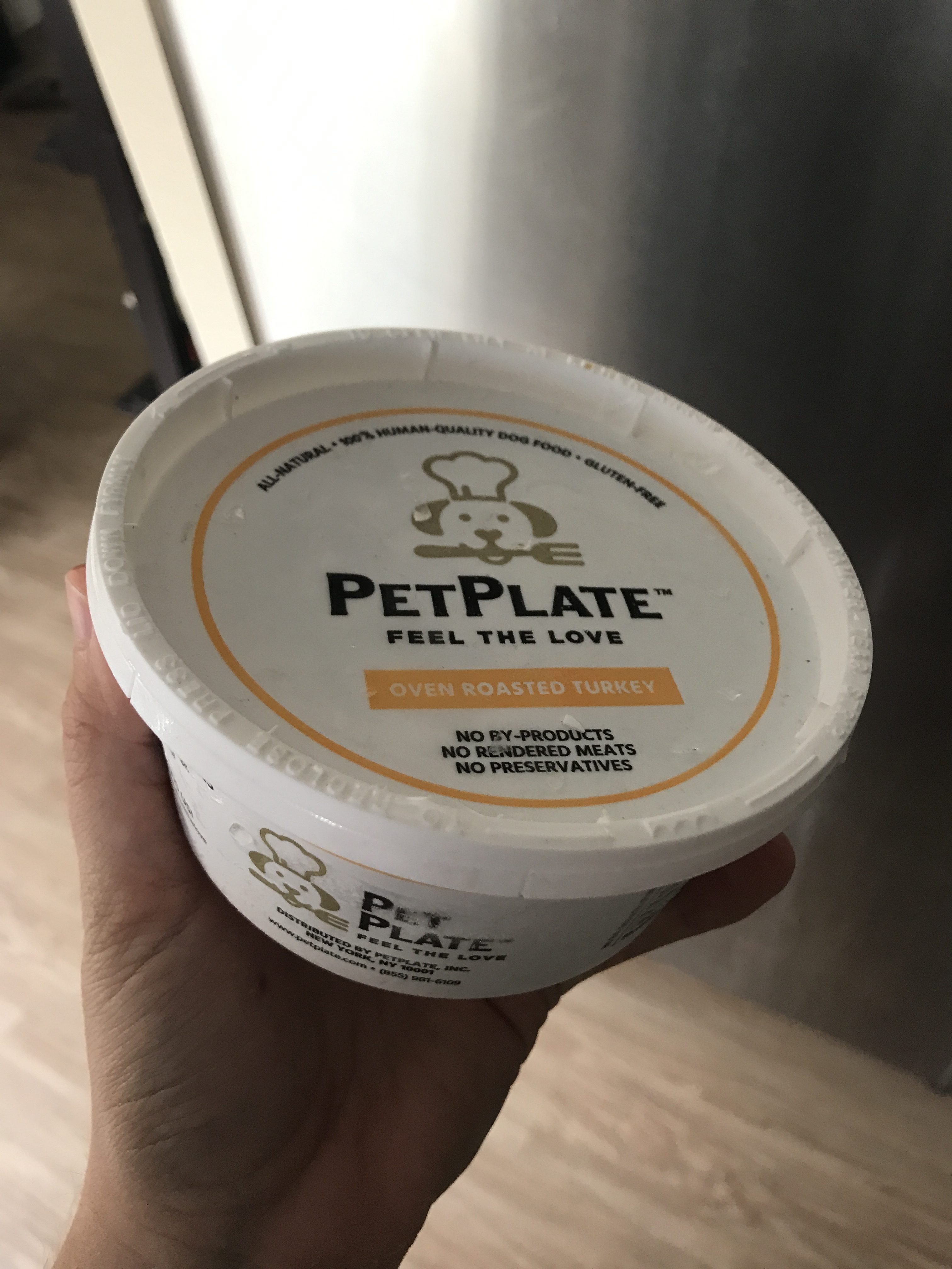 plastic tub of pet plate fresh dog food