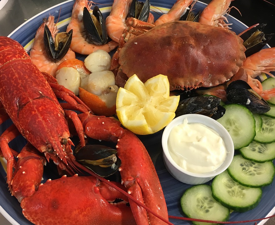 A plate of cooked lobster and crab.