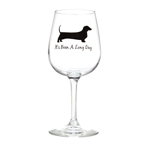 Wine glass featuring Dachshund and the text "It's been a long day"