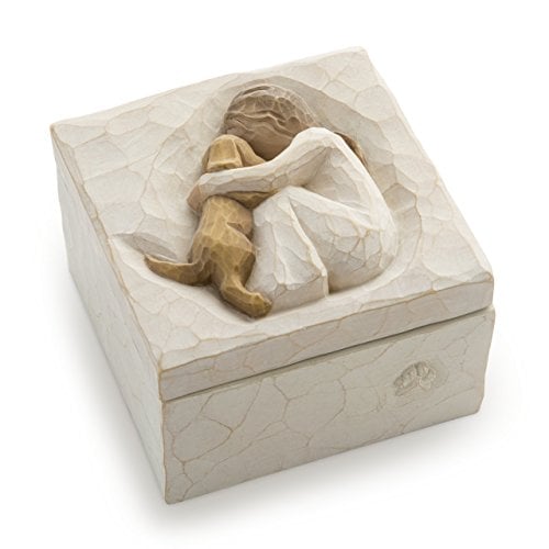 Keepsake gift box with a carving of a girl embracing a golden retriever.