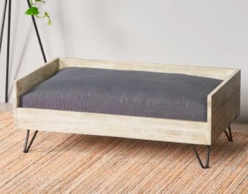 light wood frame with gray cushion elevated bed