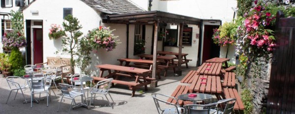 Sunny pub garden at The Golden Rule in dog friendly pub The Lake District