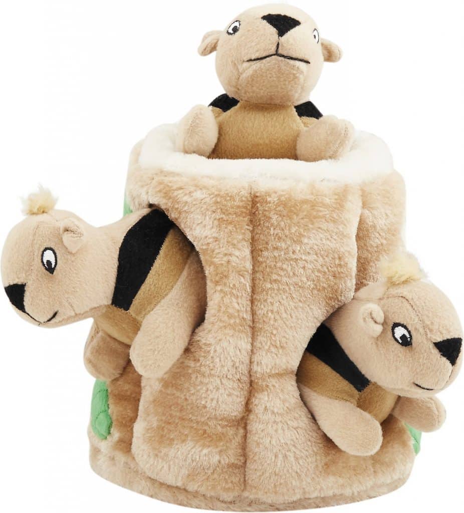Outward Hound Hide-a-Squirrel Squeaky Puzzle Toy, small plush tree trunk with holes and three little plush squirrels peeking out of the holes