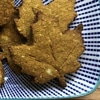 A maple leaf-shaped dog cookie