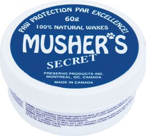 Musher's Secret pet paw protection wax for running with your dog in winter 