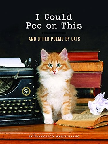 "I Could Pee on This" book with cat on desk