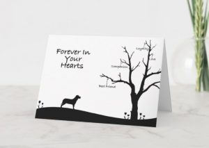 card with silhouette of dog looking at tree with words