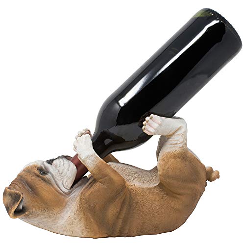 Bulldog holding wine bottle between mouth and back paws