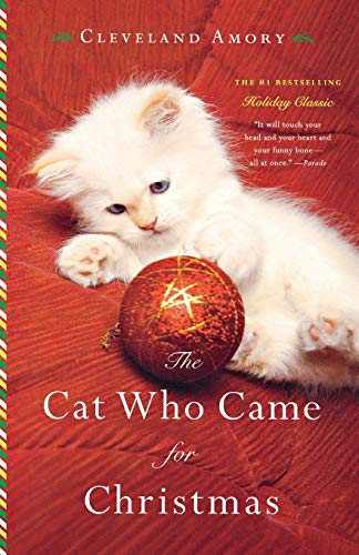 Book featuring kitten with ornament: "The Cat Who Came for Christmas"
