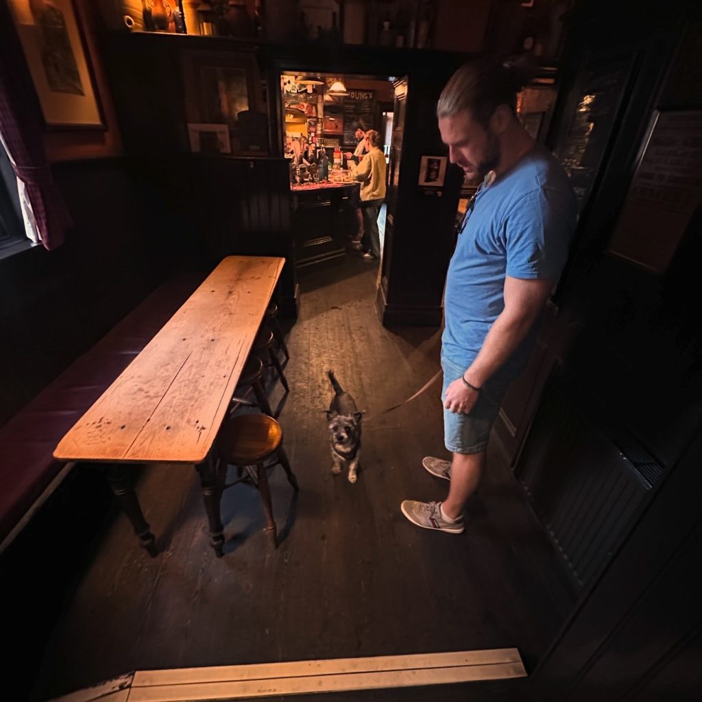A man and his dog at the pub