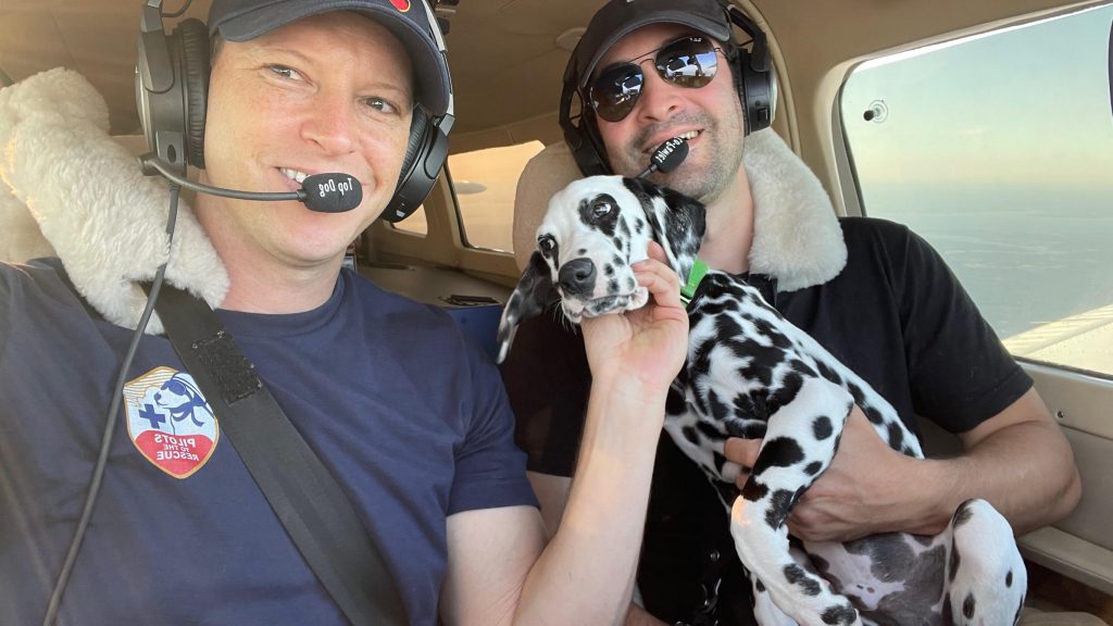 Michael Schneider flies a rescue dog to safety.