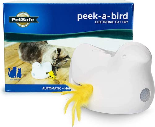 White and yellow Peek-a-Bird cat toy with package in the background. 