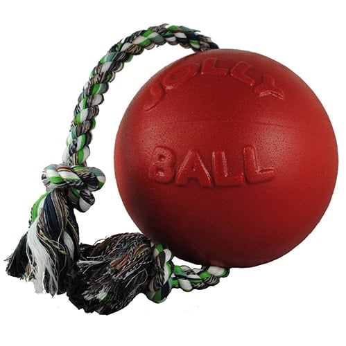 red ball with rope threaded through it