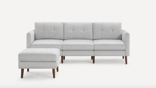 Burrow Arch Nomad Sofa with Ottoman in light gray with walnut legs