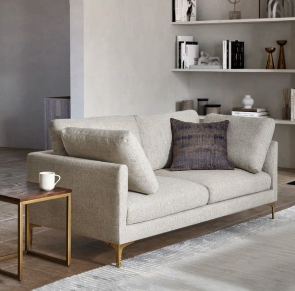 Castlery Adams Loveseat in a neutral living room in off white fabric and brass legs