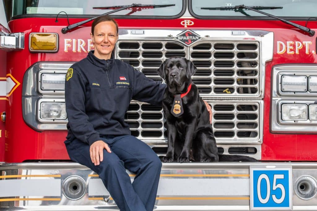 Fire dog and her handler