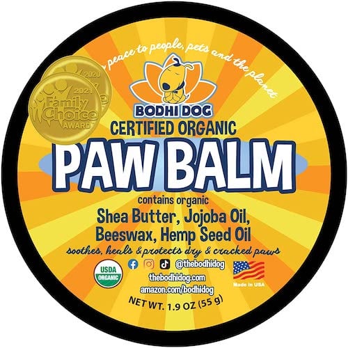 Yellow and orange dog paw balm can