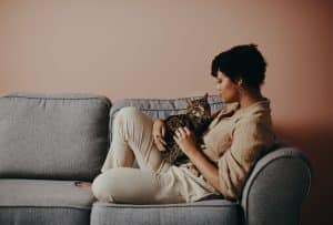 A cat left alone with a cat sitter