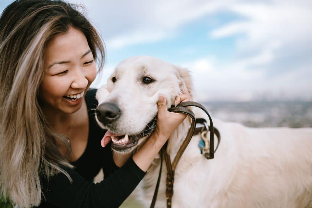 A happy woman with her happy dog