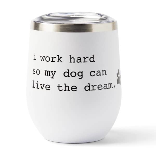 Wine tumbler from the Rover Store reading "I work hard so my dog can live the dream."