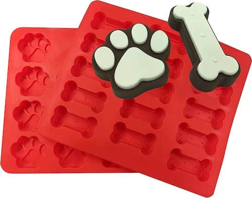 Red paw print and dog bone silicone mold trays.