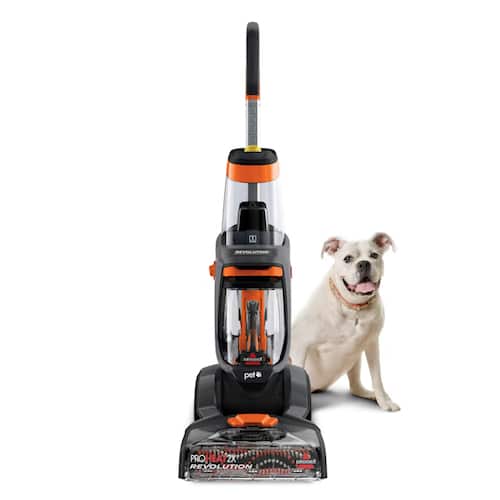 white dog next to bissell proheat 2X Revolution carpet cleaner