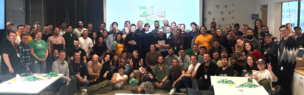 A large group photo of all the Tech Summit participants.