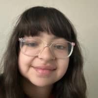 Sitter Profile Image: Justina T.